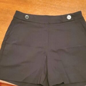 WHBM pull on shorts; color black; size 6; 2 front pockets, 2 back pockets. NWT